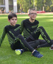 Komplet bielizny piłkarskiej KP1028J z czapką DRY Junior czarny/neonowy roz. 164/170